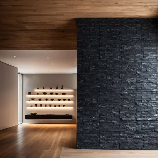 Modern interior showcasing a black marble blasted mosaic wall with minimalist design and warm ambient lighting.