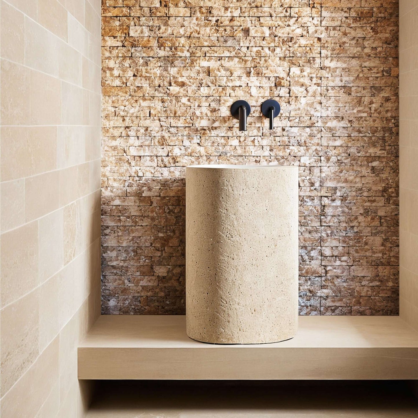 Elegant travertine vessel sink on a minimalist design backdrop, showcasing premium craftsmanship and natural stone appeal.