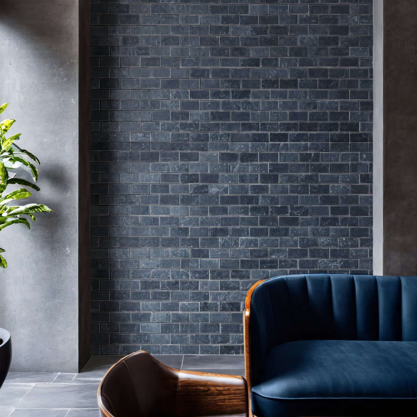 Elegant black marble wall with distressed mosaic finish, enhancing minimalist interior design.