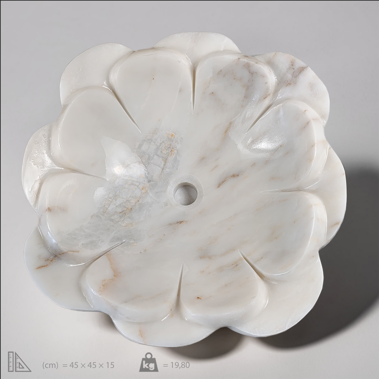 Elegant flower-shaped white marble vessel sink with a smooth polished finish and minimalist design.