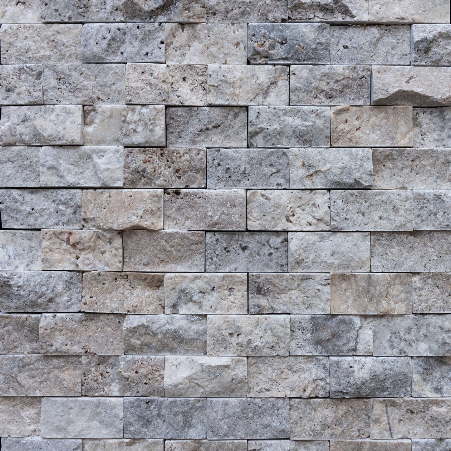 Elegant Silver Travertine Blasted Mosaic, showcasing premium natural stone with a timeless aesthetic and unique textures.