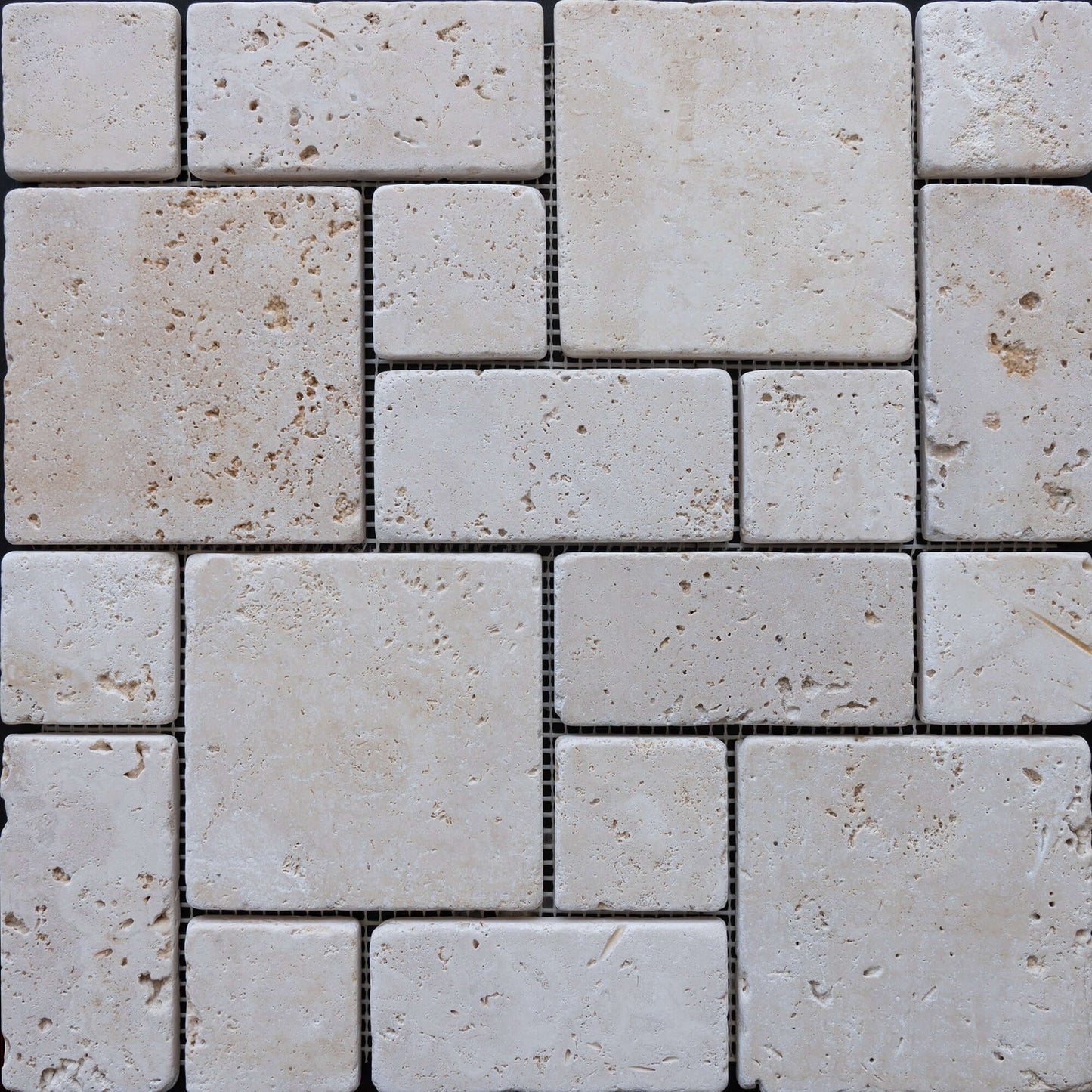 Elegant travertine distressed mosaic tile showcasing intricate mosaic craftsmanship for sophisticated interior design