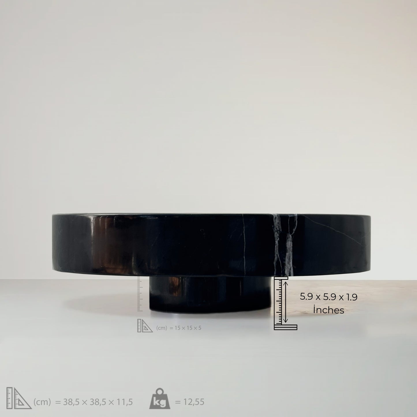 Side view of a black marble vessel sink showcasing its polished finish and minimalist design dimensions, 5.9 x 5.9 x 1.9 inches.