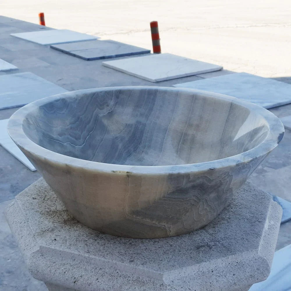 Elegant gray onyx V-shape sink showcasing contemporary design with durable, high-quality materials for modern bathrooms