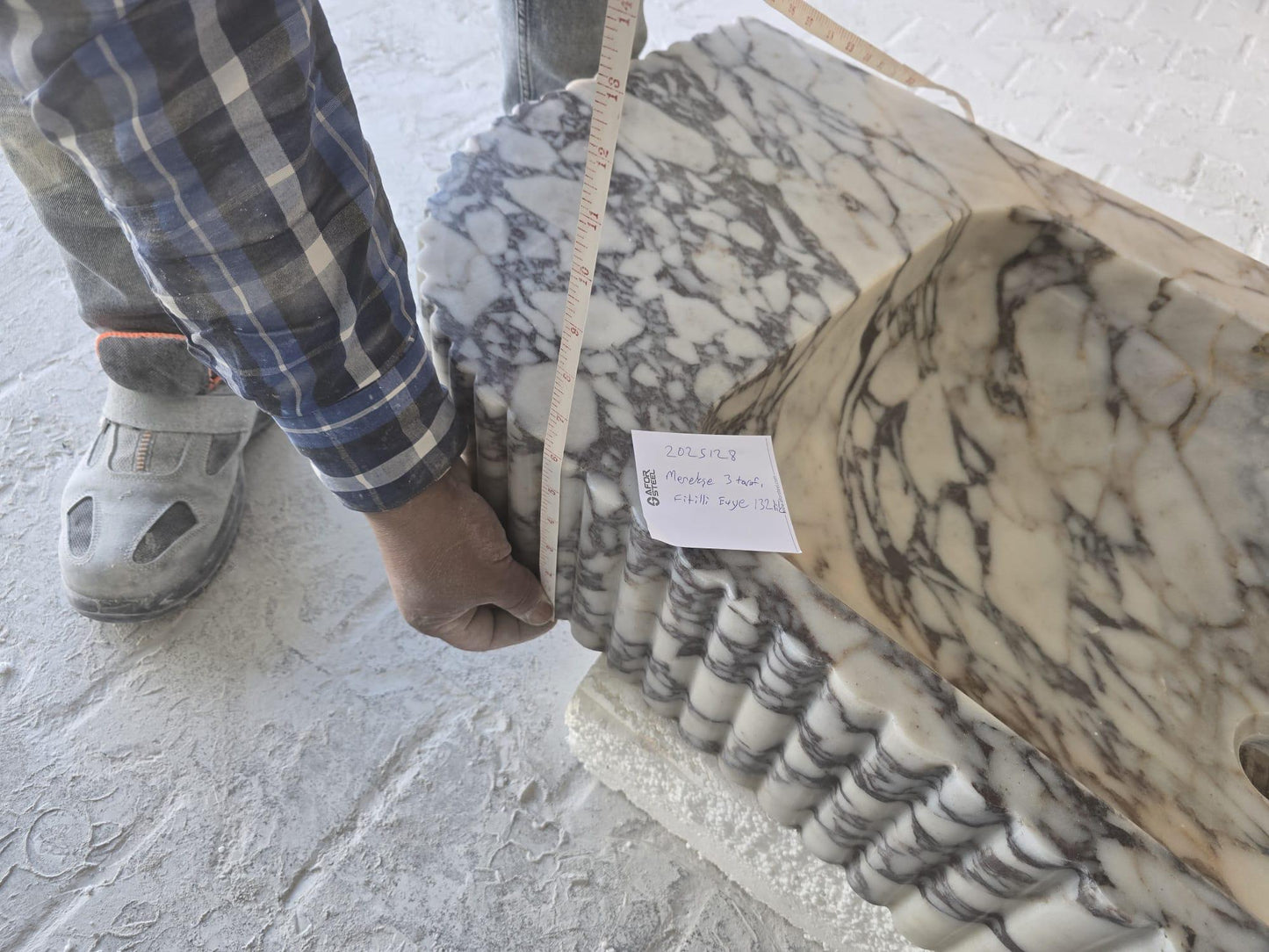 Elegant Calacatta Viola marble slab showcasing unique veining patterns and polished surface, ideal for luxurious interiors