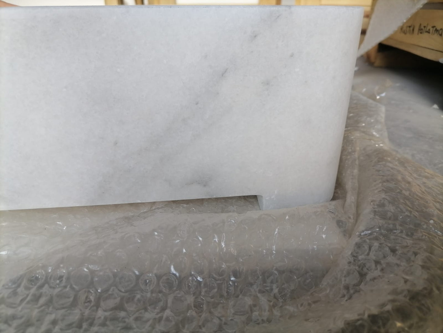 Elegant Carrara marble surface showcasing classic white and gray veining for luxurious interior designs