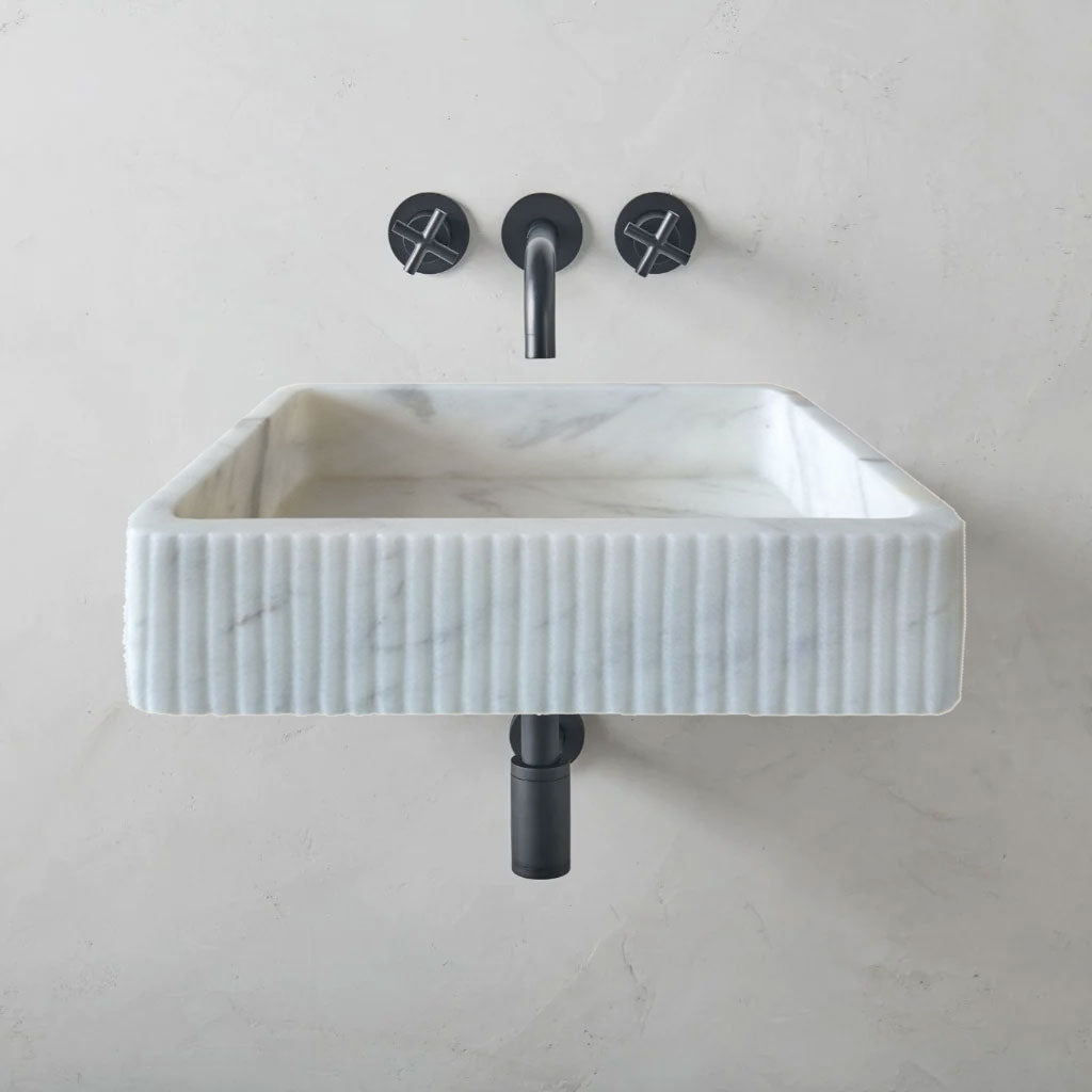 Elegant Carrara marble surface showcasing classic white and gray veining for luxurious interior designs