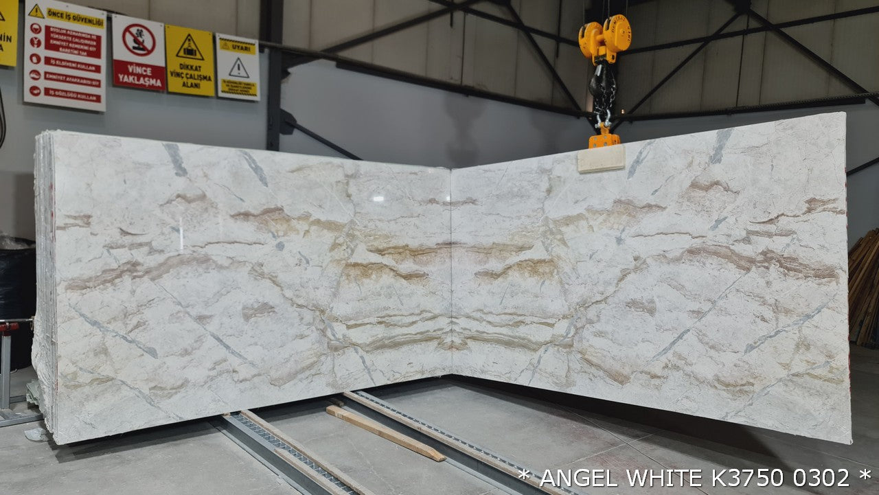 Elegant Angel White marble slabs showcasing premium quality for refined architectural designs.