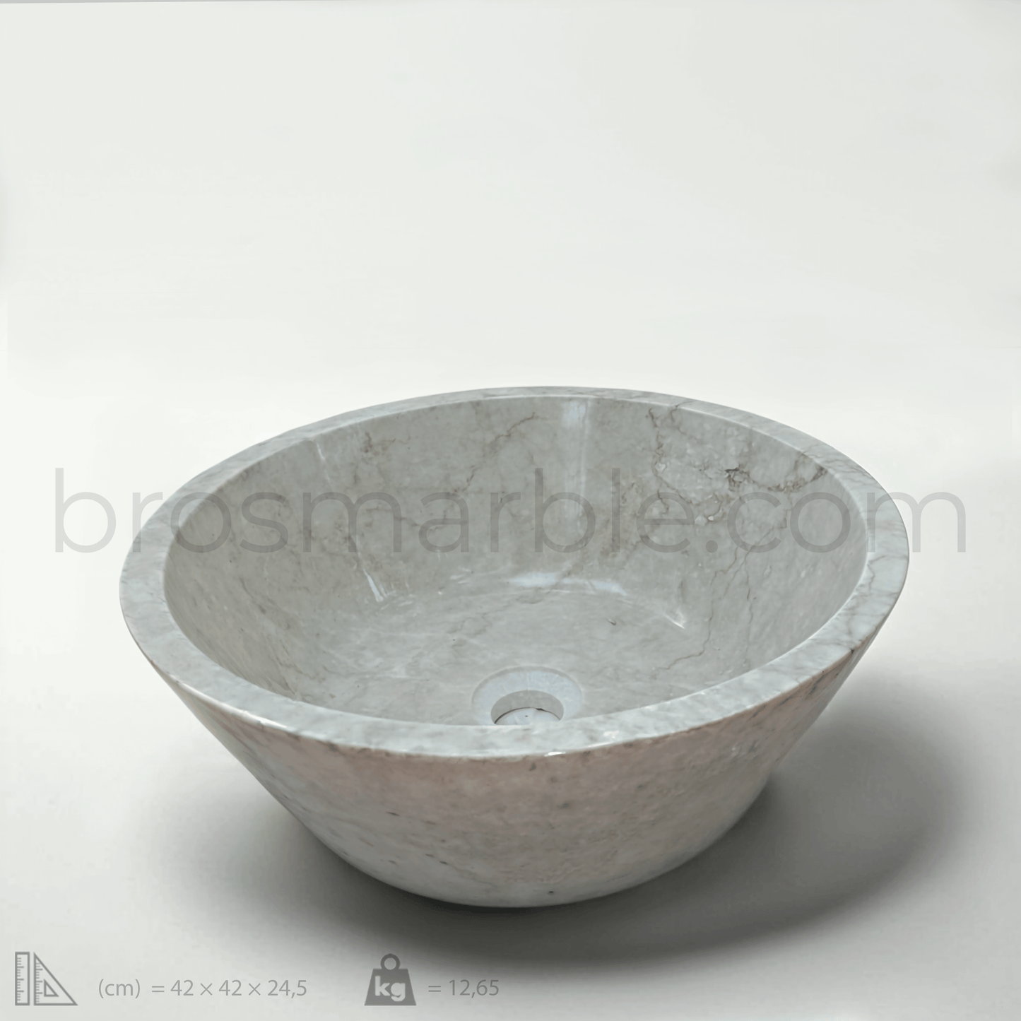 Elegant beige marble sink showcasing exquisite craftsmanship and timeless design for luxurious bathroom decor