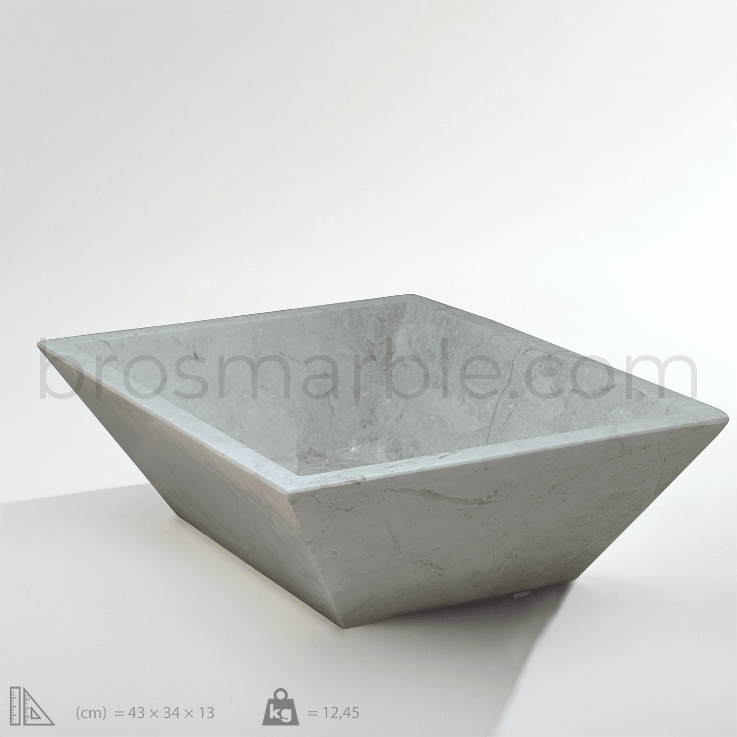 Beige marble rectangular vessel sink with polished finish and minimalist design, showcasing elegant craftsmanship.