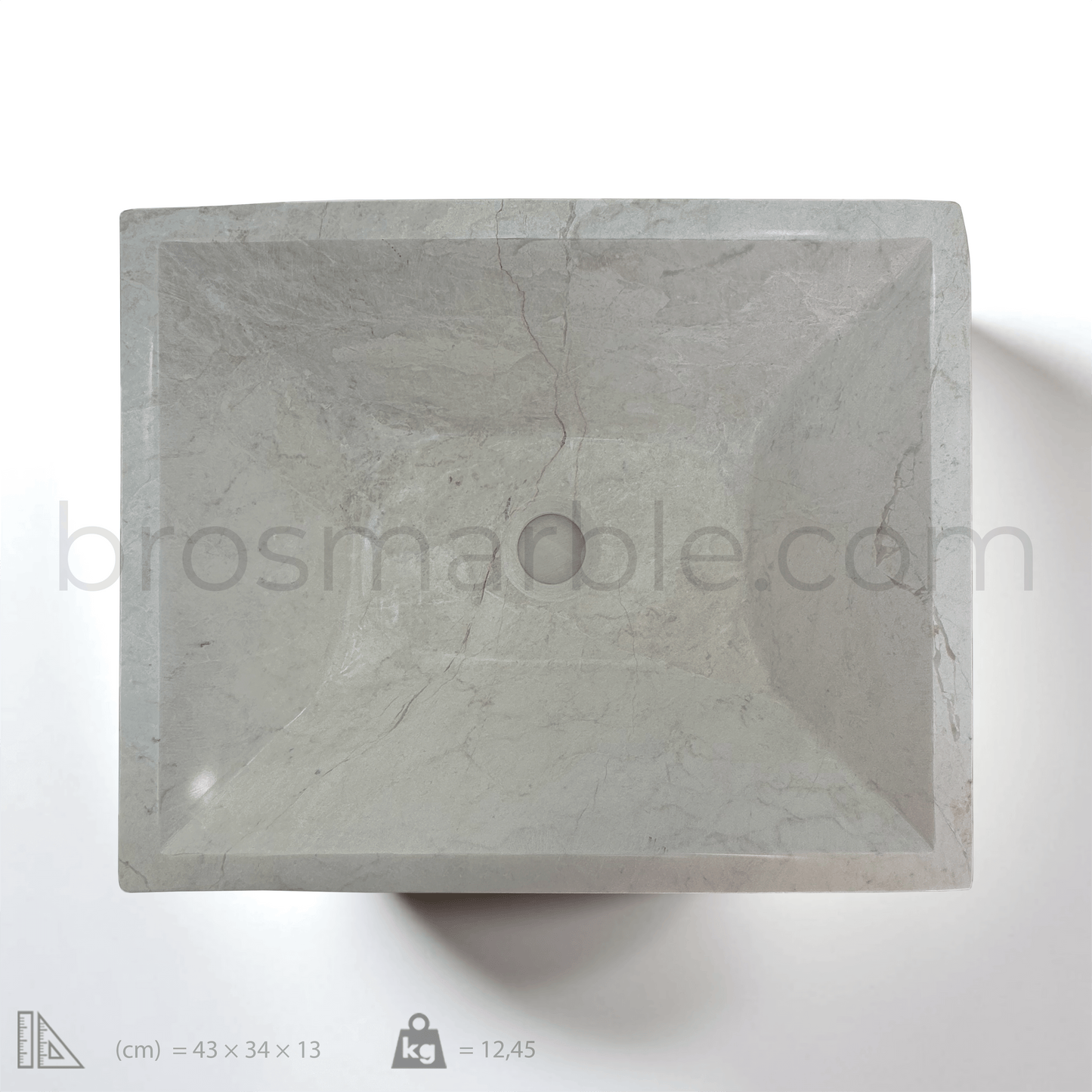 Beige marble rectangular vessel sink with a polished finish, highlighting minimalist design and natural stone elegance.