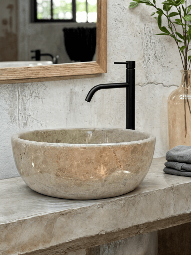 Beige marble vessel sink with polished finish, showcasing minimalist design and elegant craftsmanship.