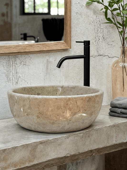 Beige Marble Round Vessel Sink ā carved from a single block of natural stone, no two pieces alike