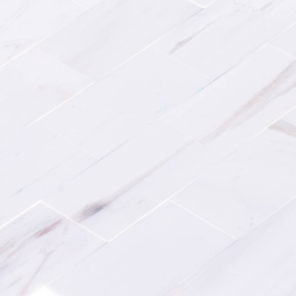 Elegant Bianco Dolomite marble tile showcasing natural stone texture, perfect for sophisticated interior flooring and wall design.