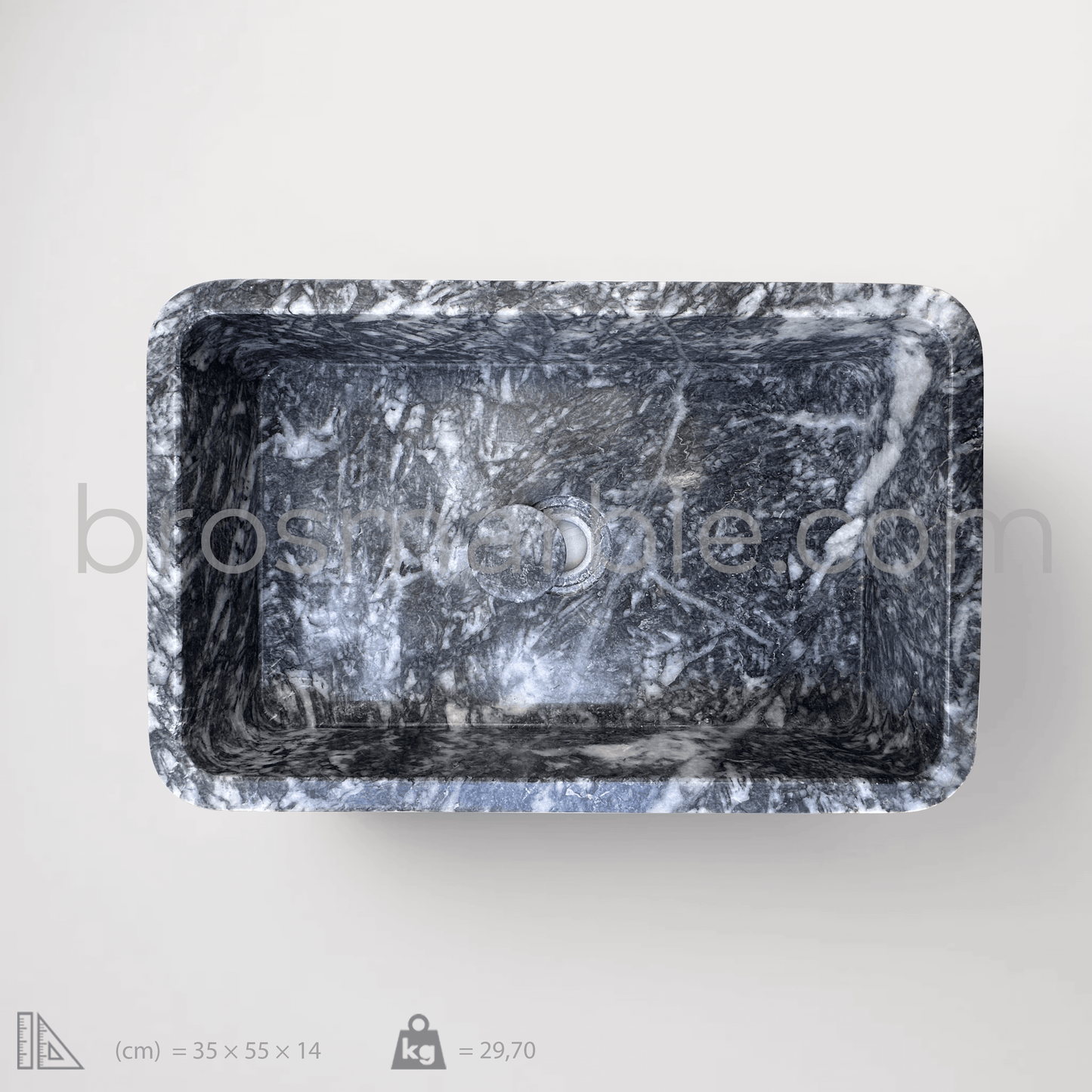 Black marble rectangular vessel sink with polished finish, showcasing deep tones and minimalist design.