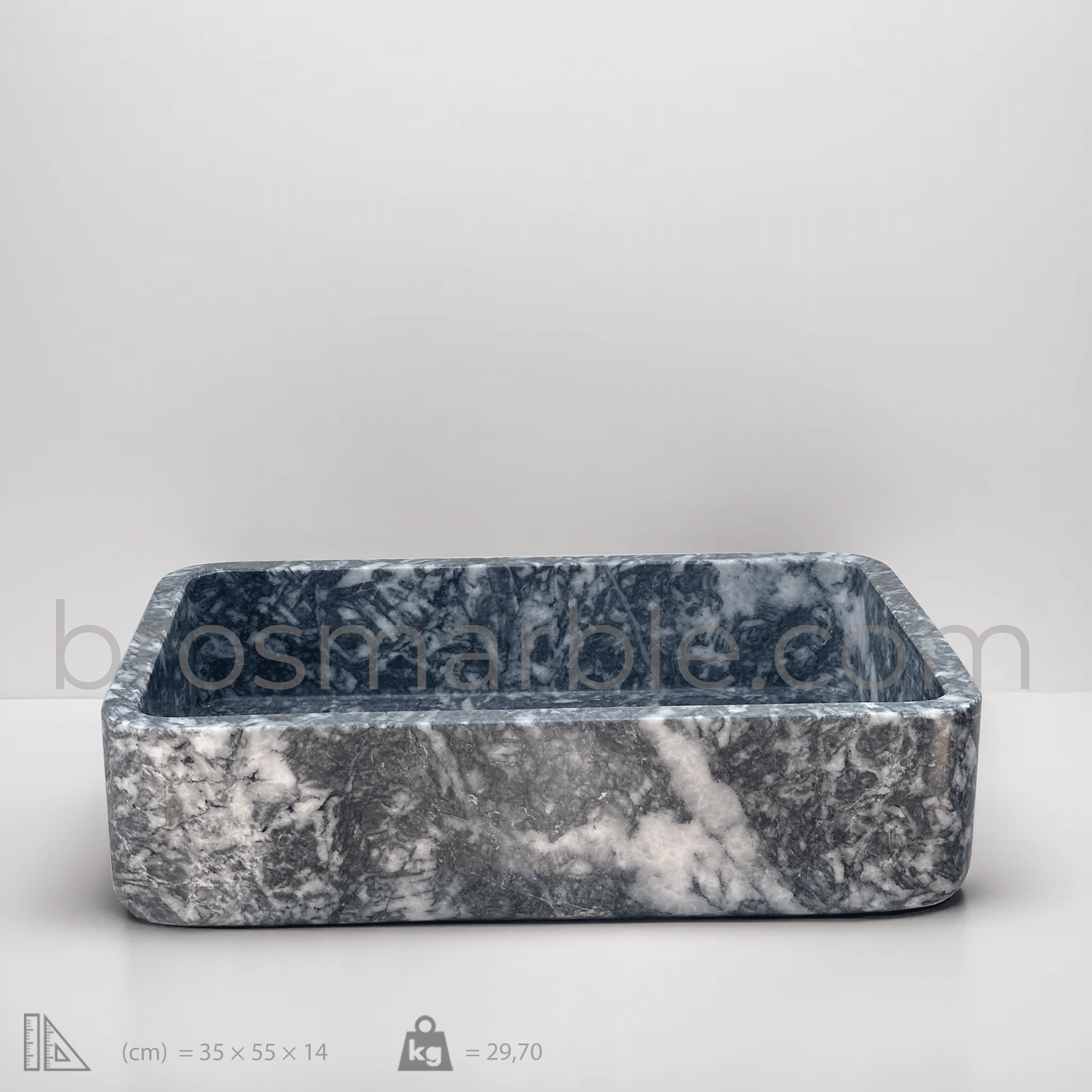 Black marble rectangular vessel sink with a polished finish, showcasing minimalist design and unique veining.