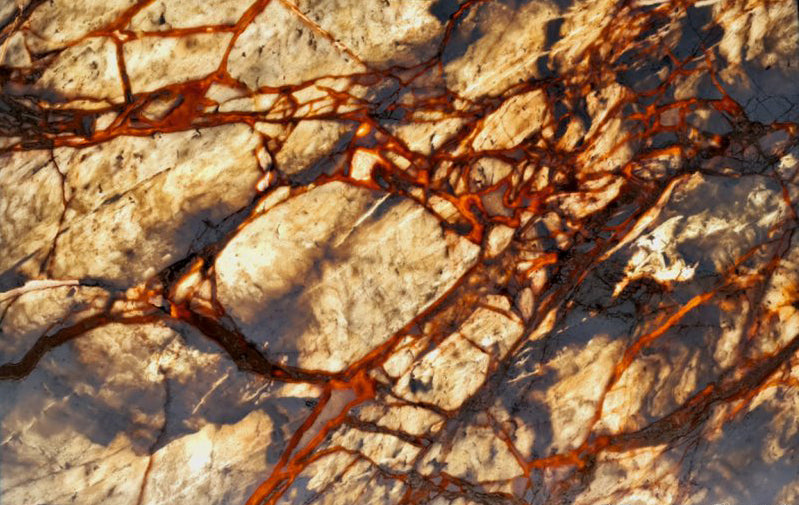Elegant breccia marble surface showcasing natural stone patterns ideal for luxury interior design and architectural projects.
