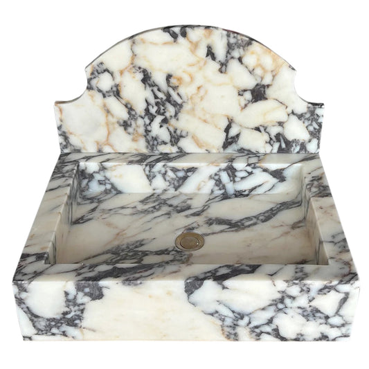 Elegant Calacatta Viola wall-mount sink showcasing luxurious marble design for modern bathrooms