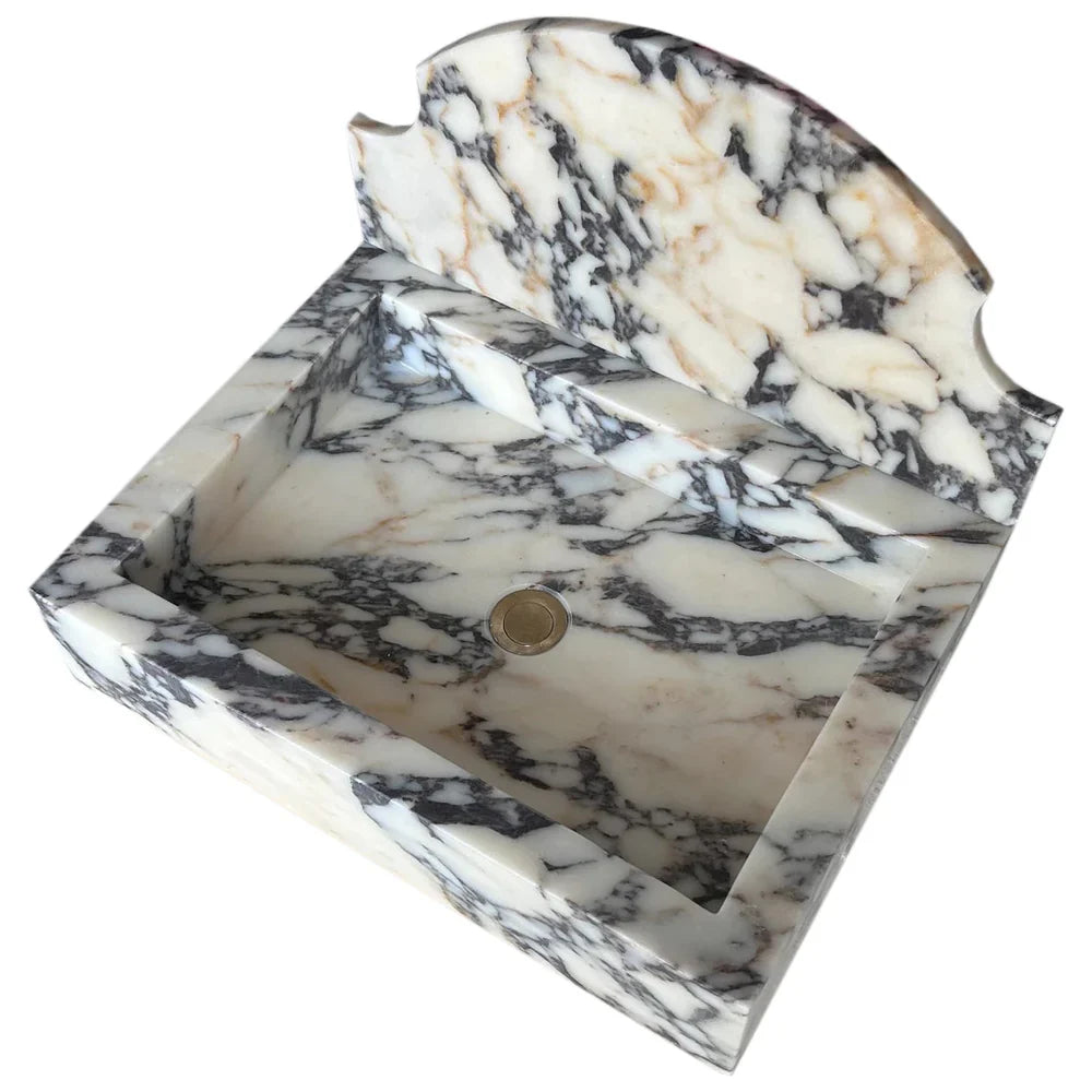 Elegant Calacatta Viola wall-mount sink showcasing luxurious marble design for modern bathrooms