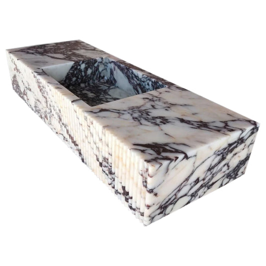 Elegant Calacatta Viola marble vanity showcasing luxurious natural stone for sophisticated bathroom design.
