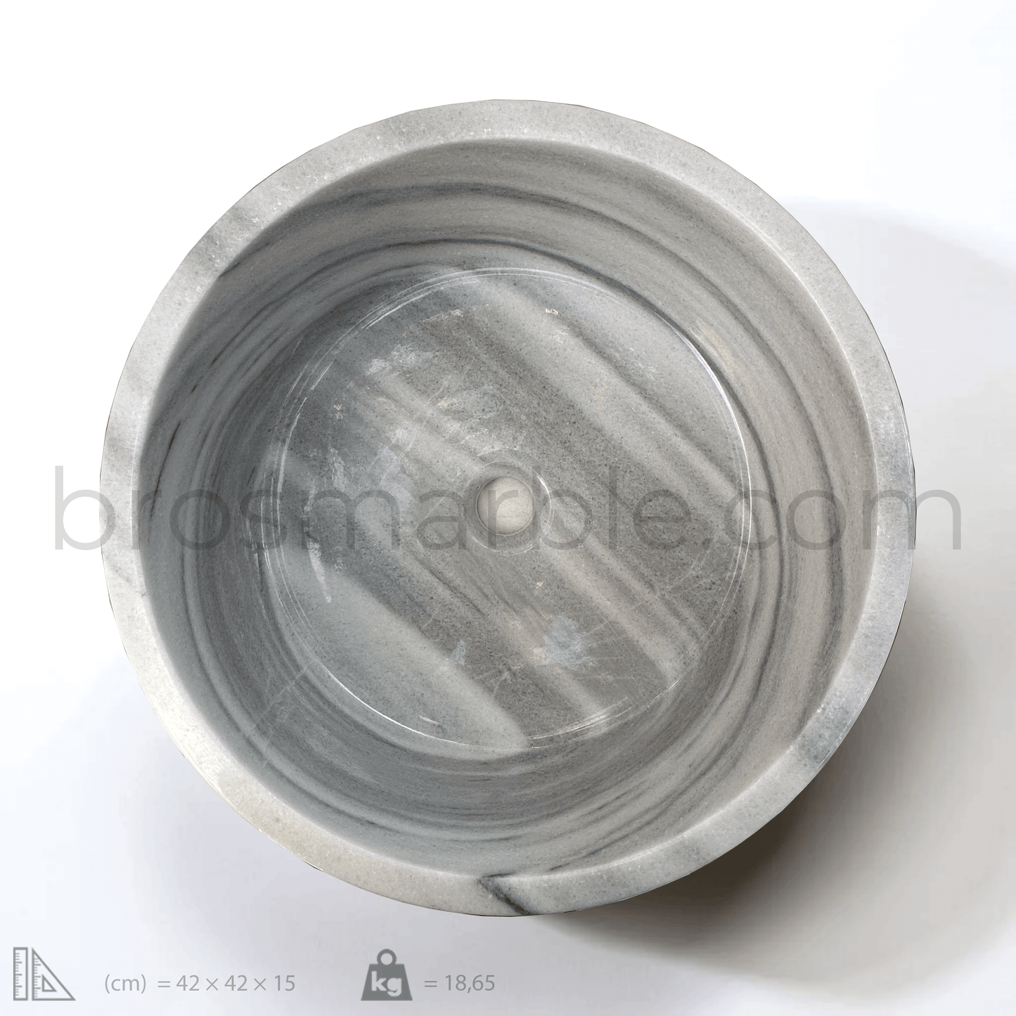 Gray marble cylindrical vessel sink showcasing polished finish and minimalist design, ideal for modern bathrooms.