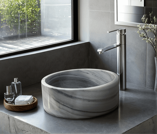 Gray Marmara Cylinder Vessel Sink in natural marble ā carved from a single block of natural stone, no two pieces alike