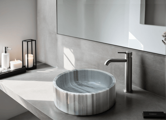 Gray Marmara Cylinder Vessel Sink in natural marble ā carved from a single block of natural stone, no two pieces alike