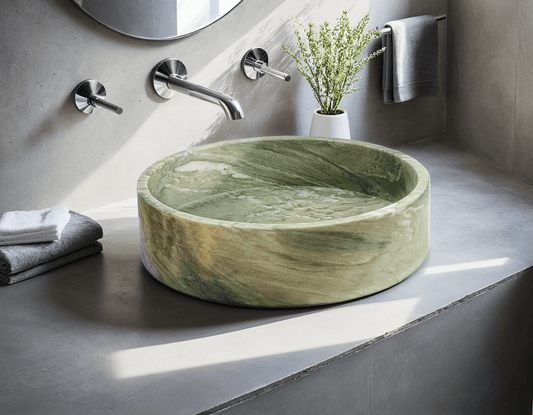 Green Marble Vessel Sink ā carved from a single block of natural stone, no two pieces alike