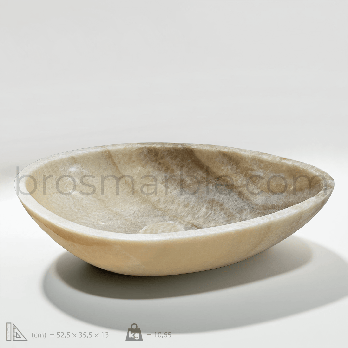 Honey Onyx Marble vessel sink showcasing polished finish, minimalist design, and natural stone craftsmanship.