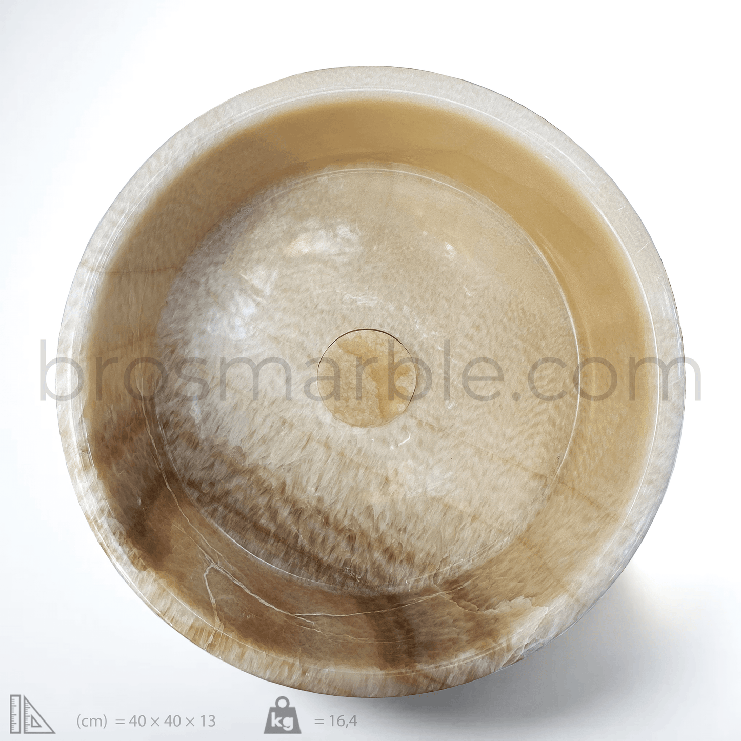 Honey Onyx marble vessel sink with polished finish, showcasing natural stone's unique veining and minimalist design.