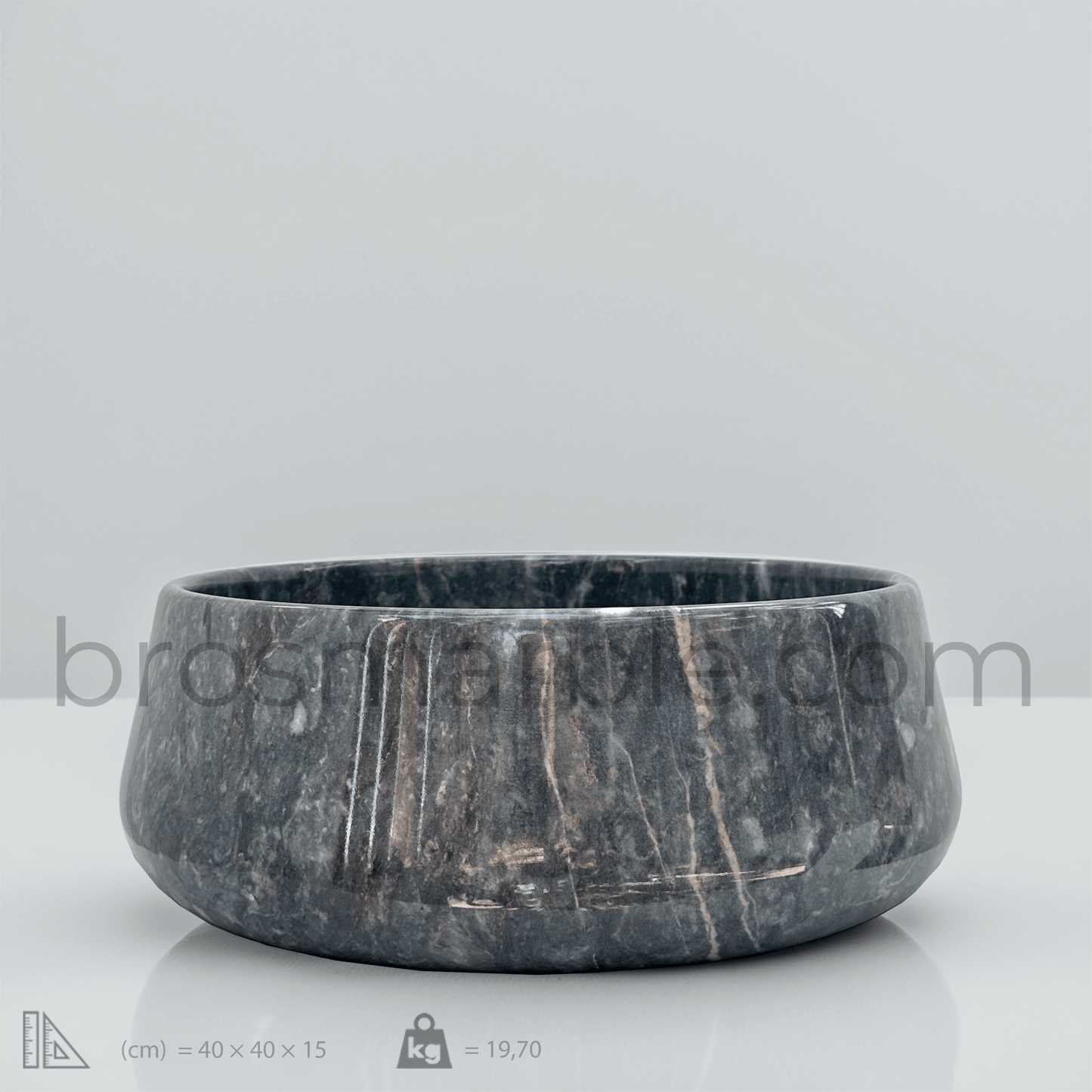Blue marble vessel sink showcasing polished finish, minimalist design, and natural stone elegance.