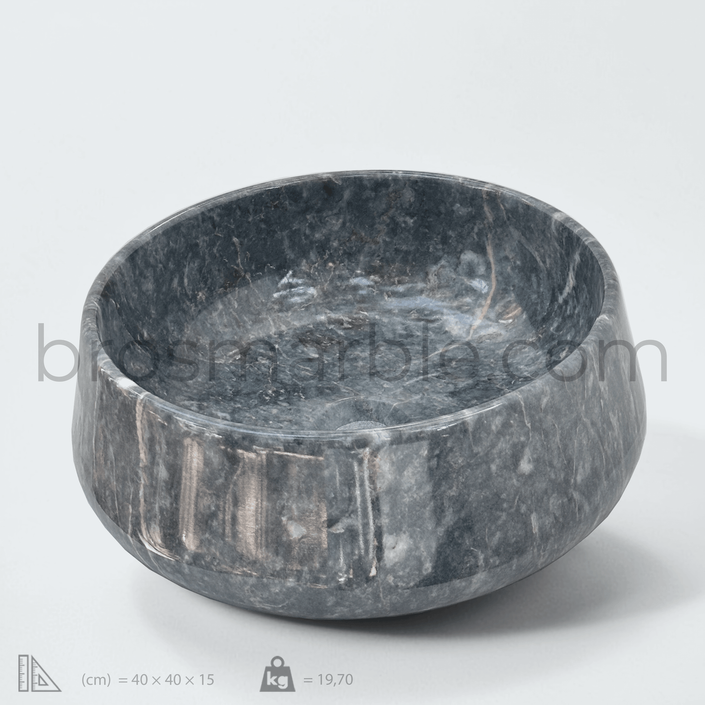 Polished blue marble vessel sink showcasing minimalist design and natural stone craftsmanship.