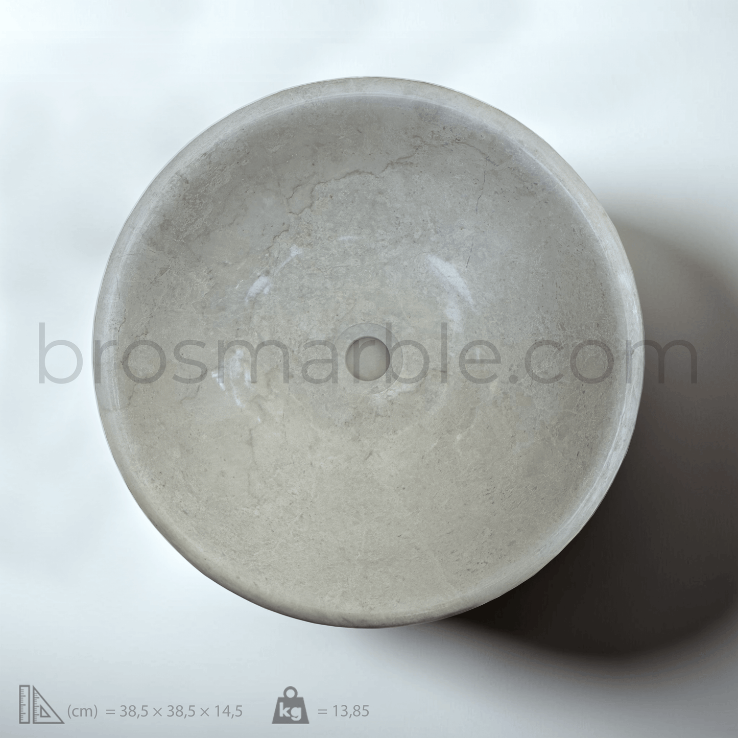 Elegant beige marble sink showcasing natural stone texture for a sophisticated bathroom design.
