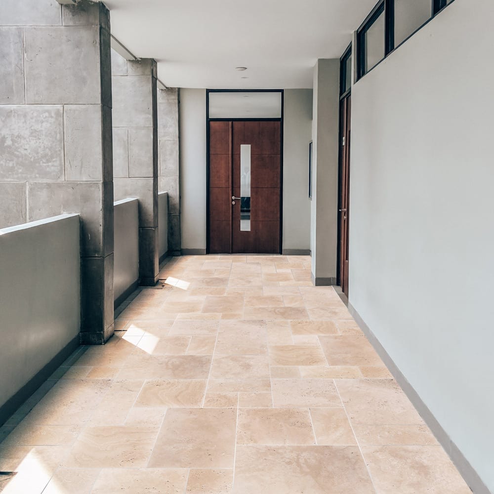 Elegant travertine tiles showcasing natural stone texture and durability for sophisticated flooring solutions.