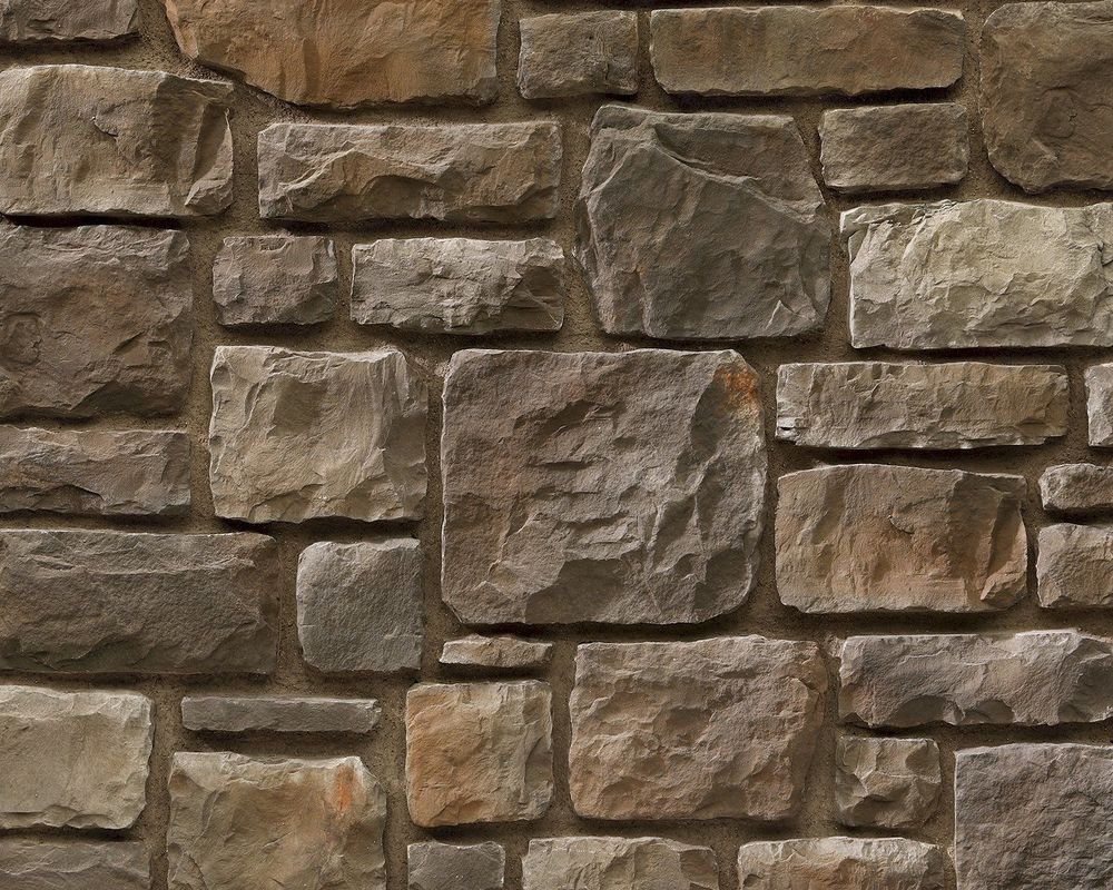 Elegant ashlar stone wall showcasing refined craftsmanship and timeless architectural design.
