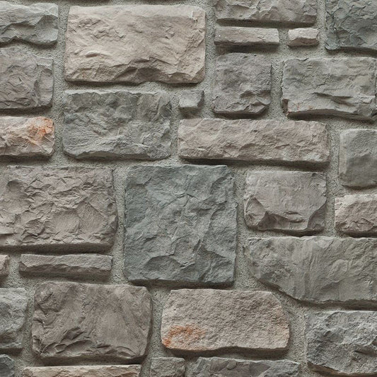 Elegant Ashlar Pattern stone wall constructed with high-quality manufactured stone, perfect for modern architectural designs.
