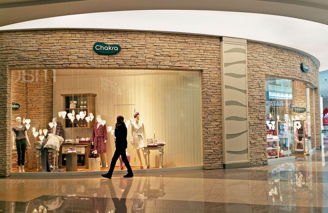 Sierra Pearl manufactured stone exterior wall showcasing natural texture and durability