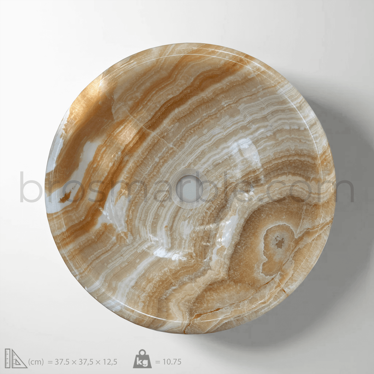 Orange onyx round vessel sink with polished finish, showcasing unique honey and caramel veining in minimalist design.