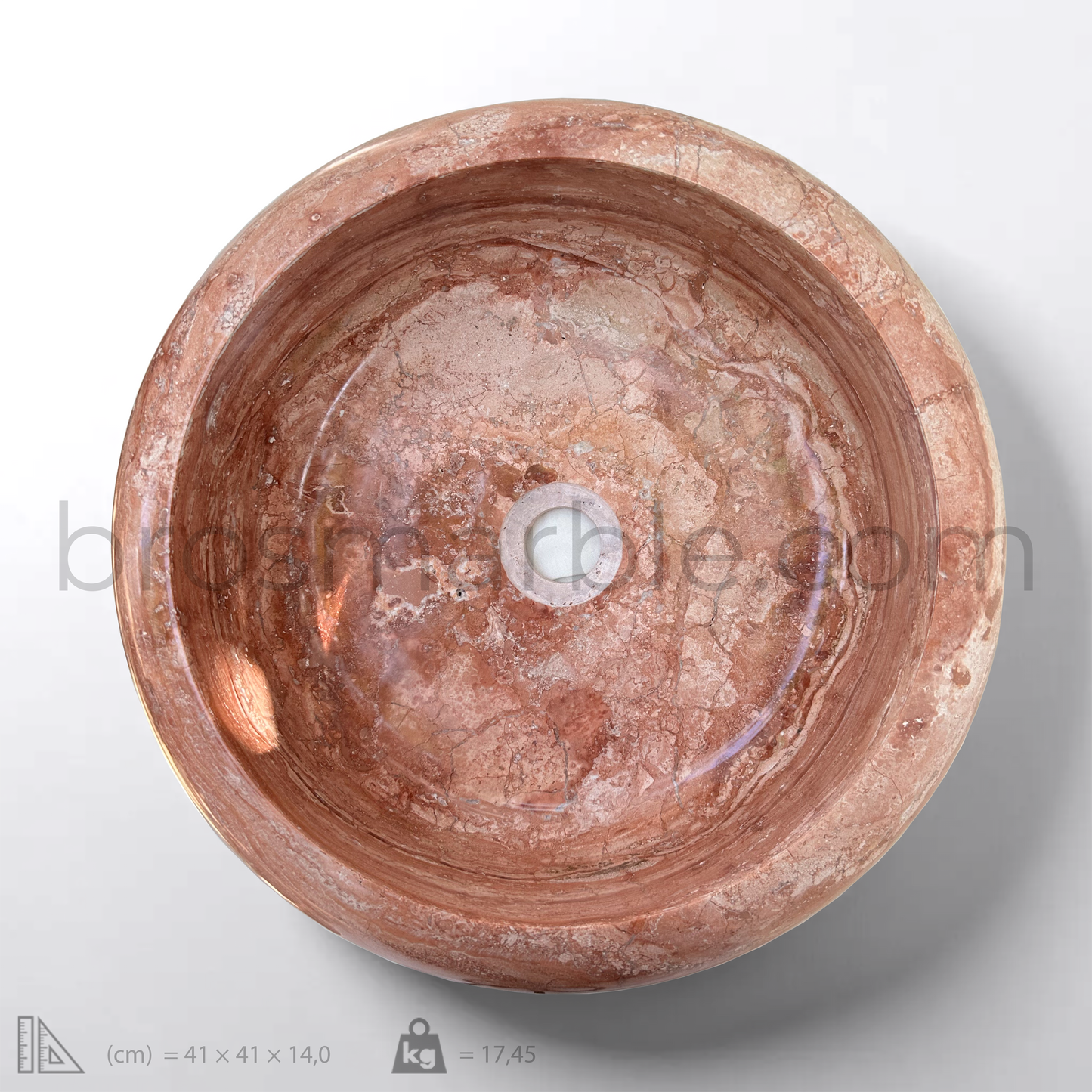 Handcrafted red travertine round vessel sink showcasing a polished finish and unique veining, ideal for minimalist bathroom design.