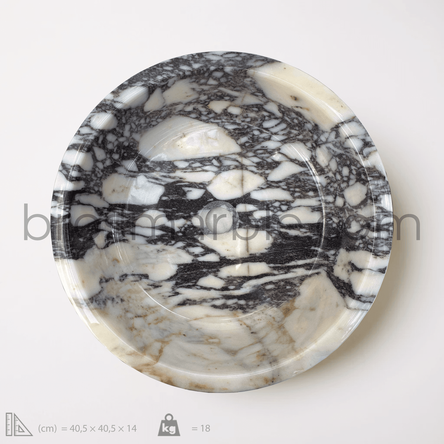 Viola Marble Vessel Sink with polished finish, showcasing unique black and white veining in a minimalist design.