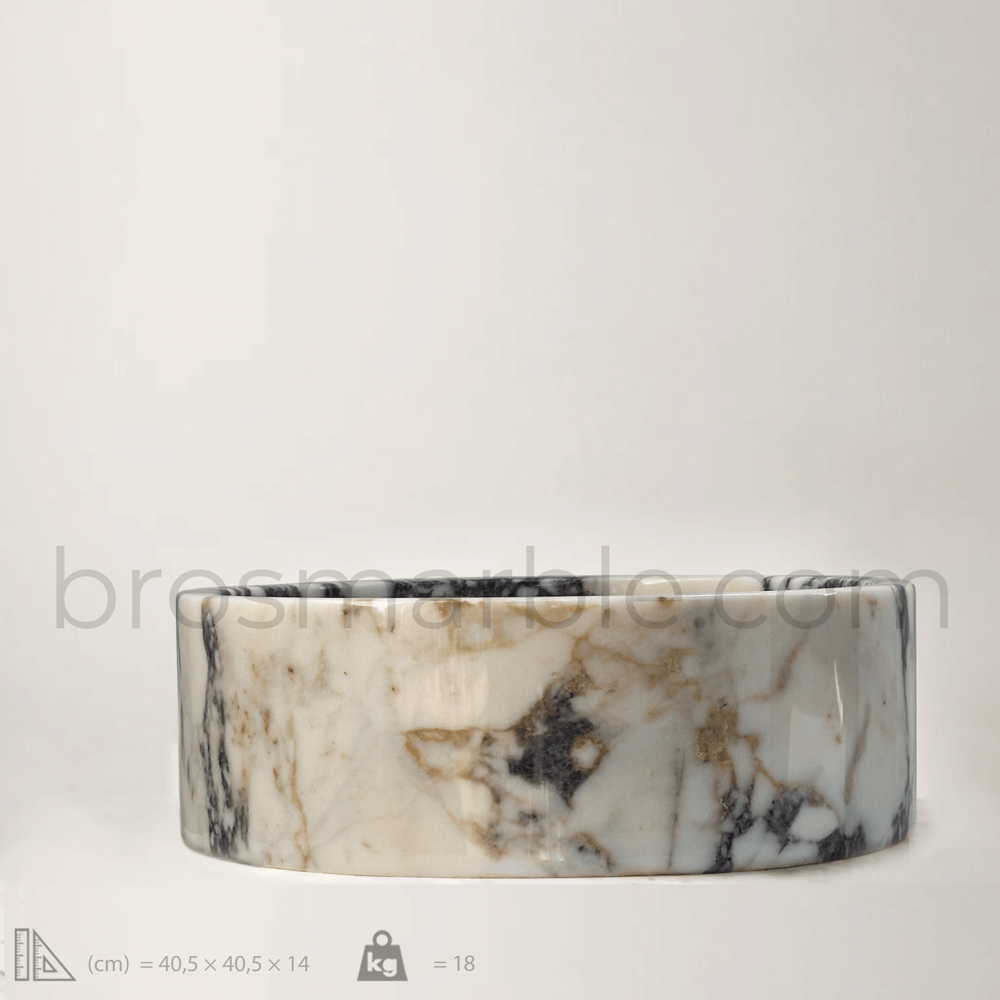 Viola Marble Vessel Sink showcasing premium marble with a polished finish, featuring unique veining and minimalist design.