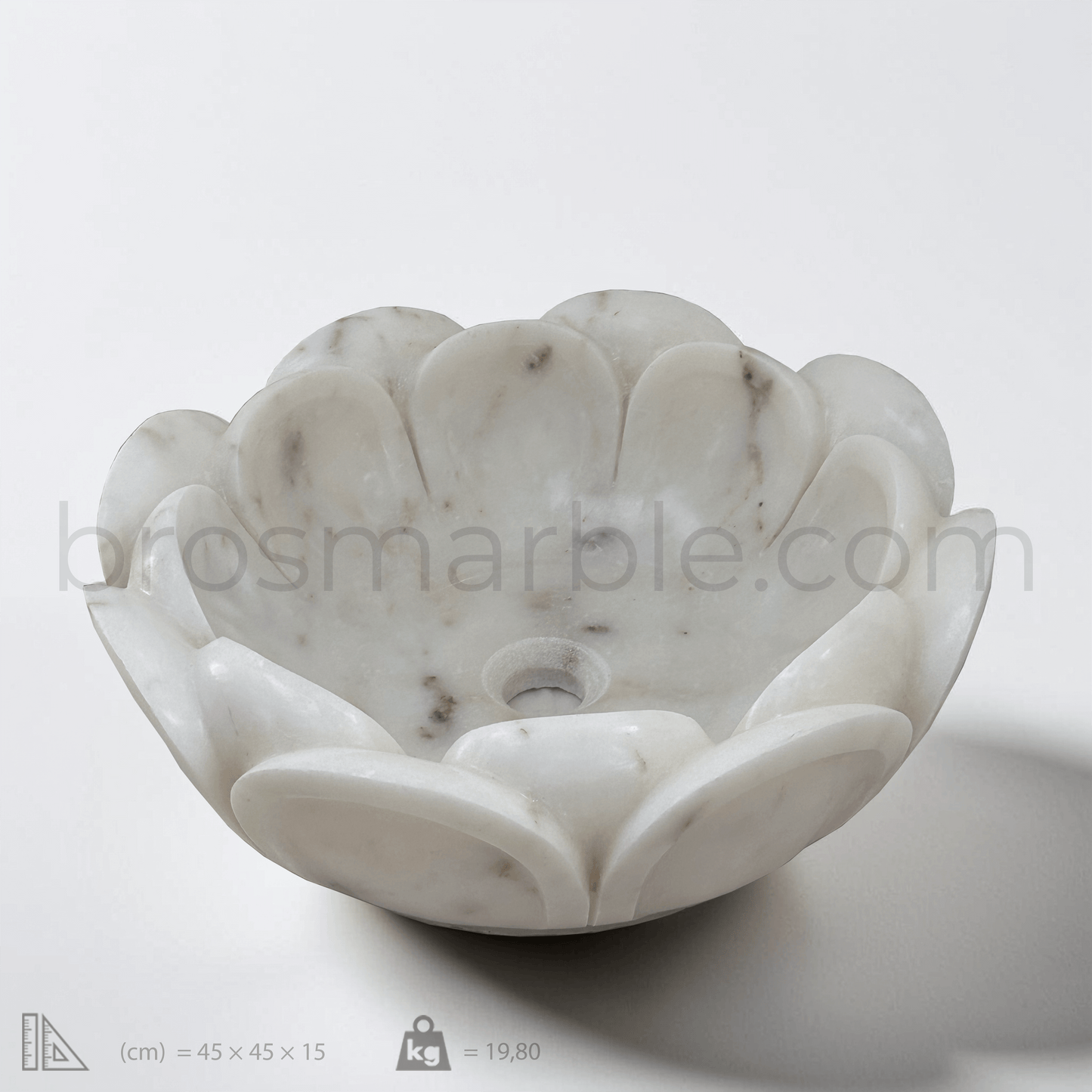 White marble flower-shaped vessel sink with polished finish, showcasing elegant petal design and minimalist aesthetics.