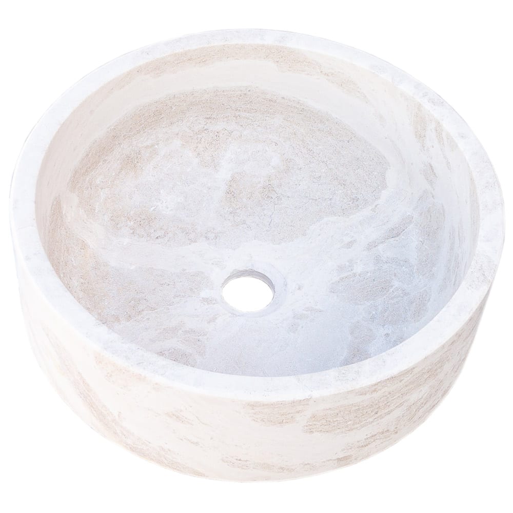 Elegant limestone vessel sink showcasing natural stone texture, perfect for modern bathroom designs
