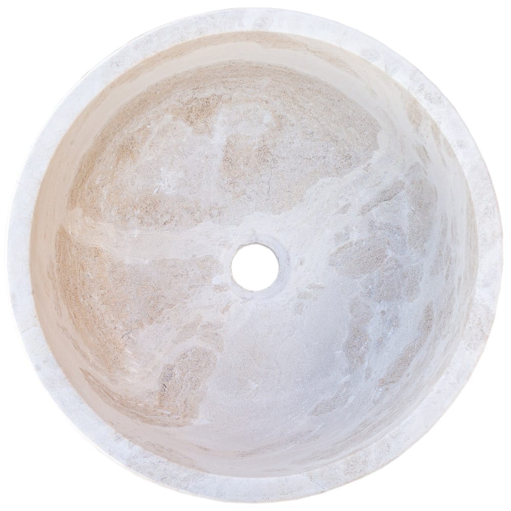 Elegant limestone vessel sink showcasing natural stone texture, perfect for modern bathroom designs
