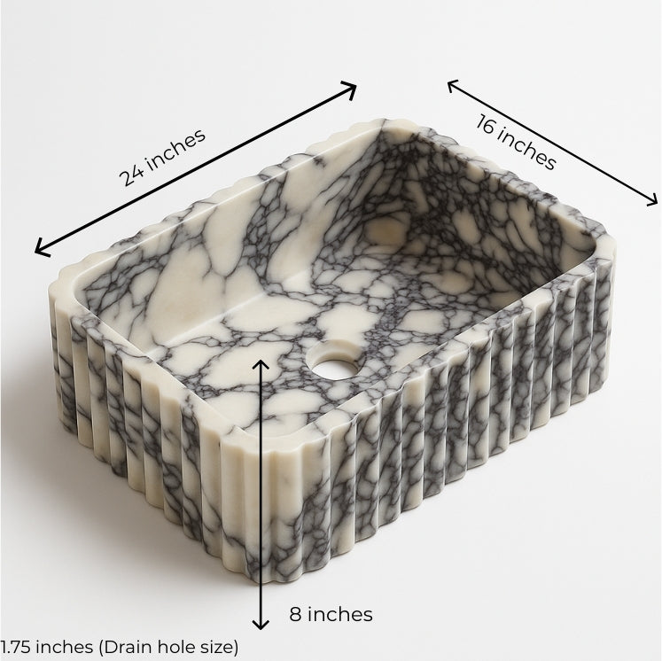Calacatta Viola marble sink showcasing unique veining, dimensions 24x16x8 inches, elegant wall-mounted basin.