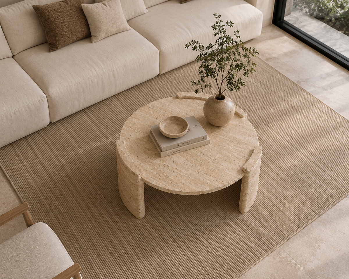 Arc Travertine Coffee Table top view highlighting the natural travertine texture and unique stone variations.