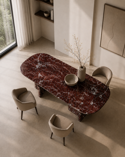 Cherry Red marble dining table viewed at an angle, with the L-shaped marble bases visible