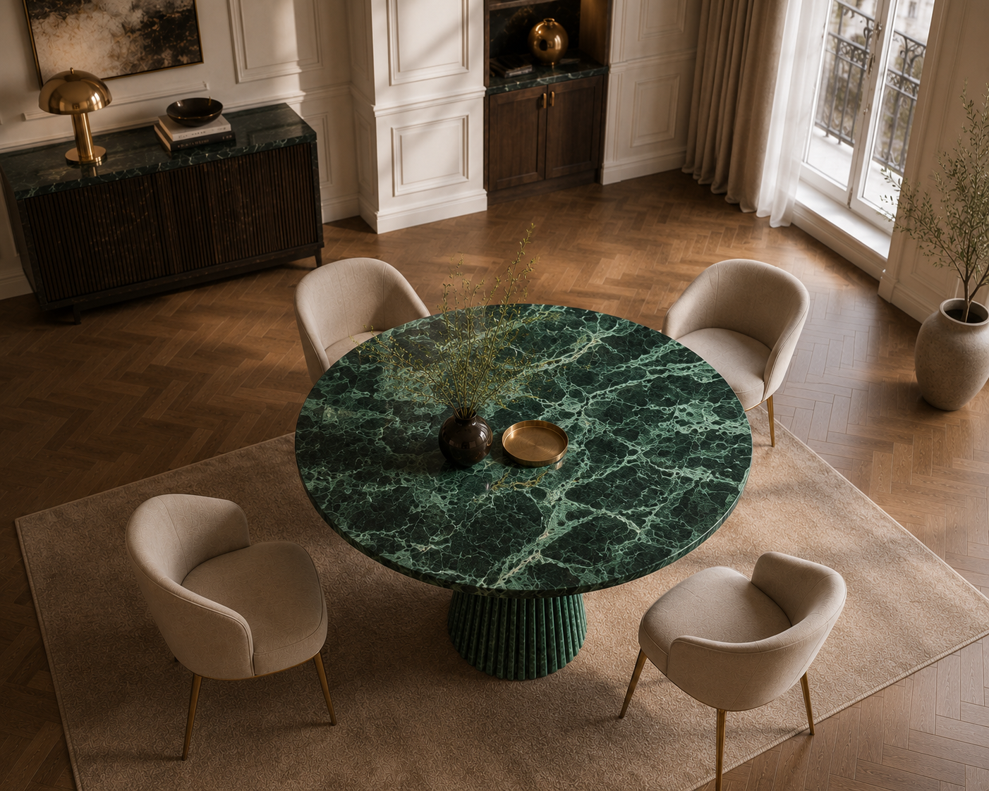 Verde Guatemala green marble round dining table photographed from above, showing the emerald veining