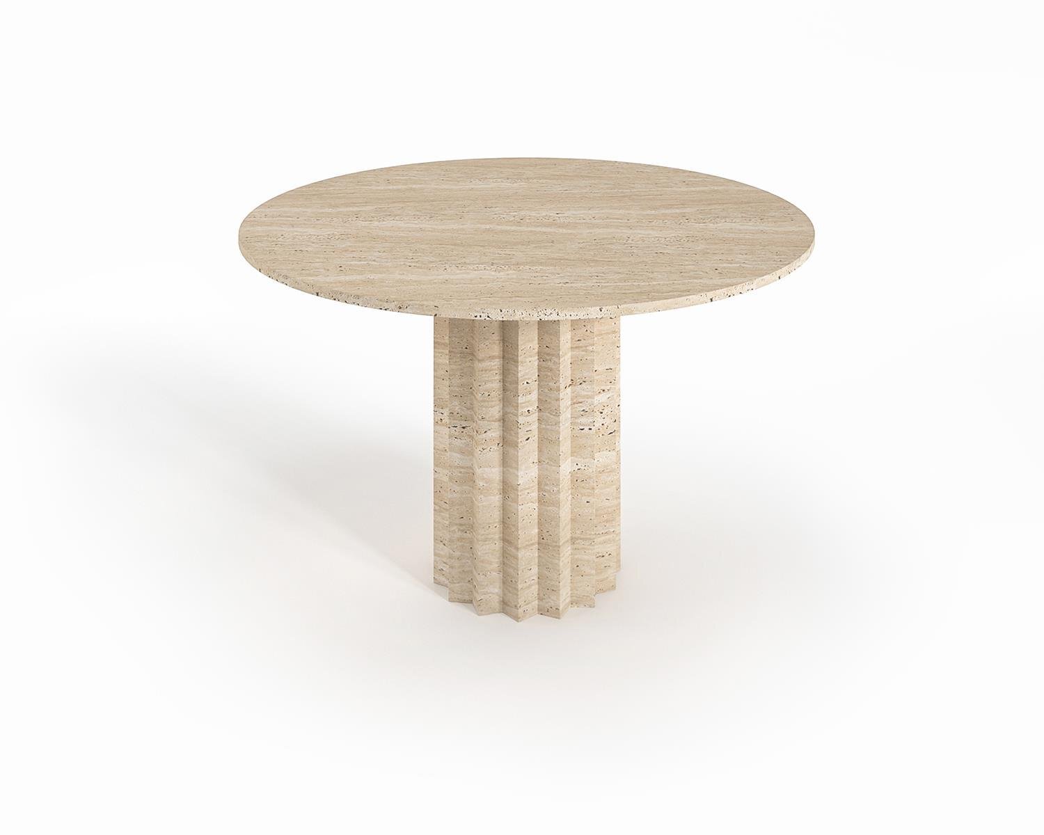 Bros Arizona travertine round dining table, studio view of the fluted stone pedestal
