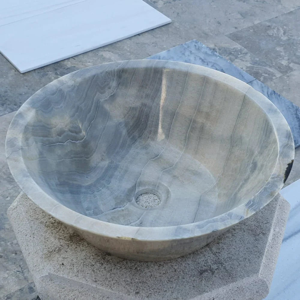Elegant gray onyx V-shape sink showcasing contemporary design with durable, high-quality materials for modern bathrooms
